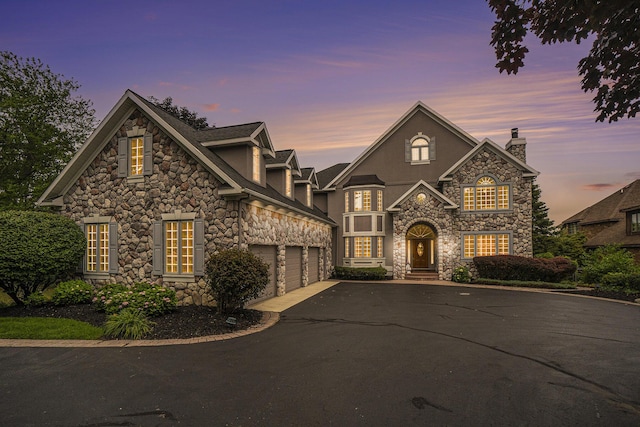 view of front of home with a garage