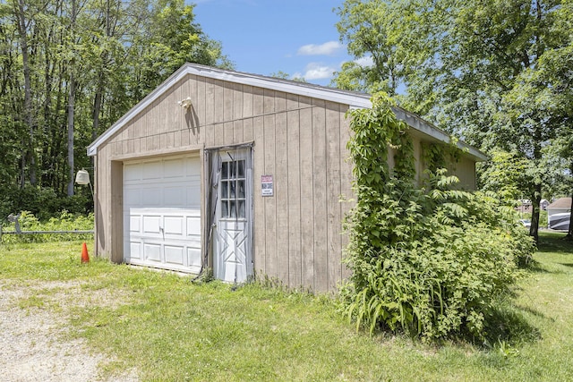 garage with a yard