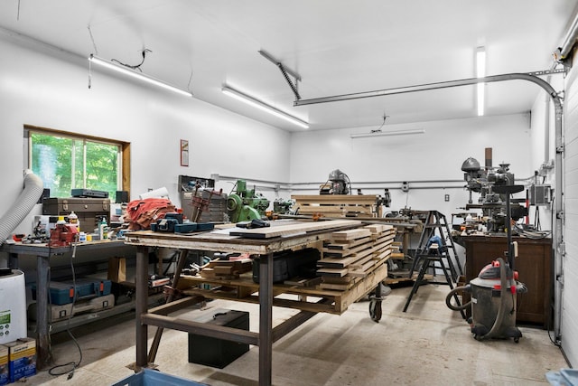 garage with a workshop area