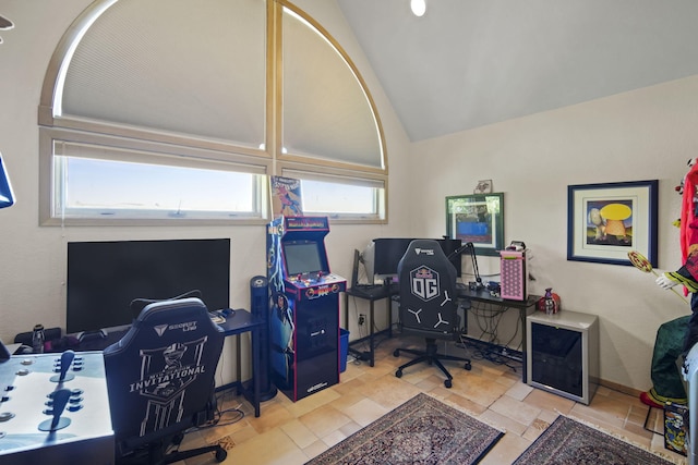 home office featuring lofted ceiling