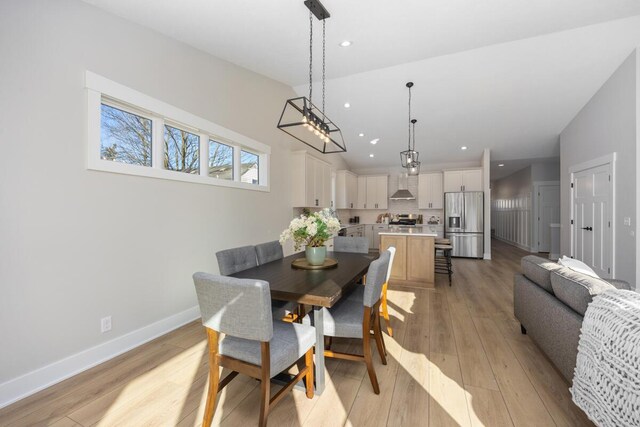 dining room featuring light hardwood / wood-style flooring