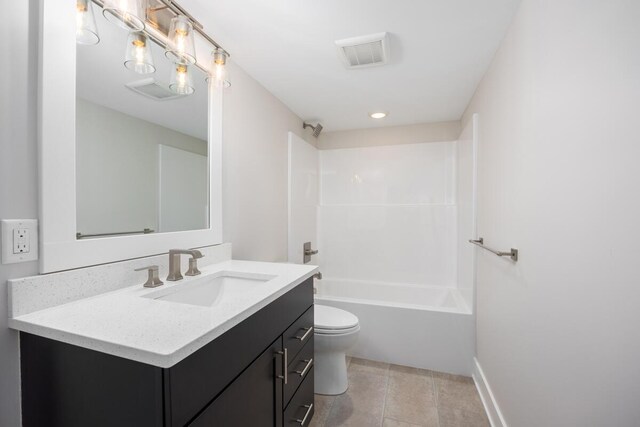 full bathroom with shower / bath combination, vanity, tile patterned flooring, and toilet