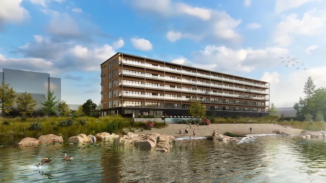 view of building exterior with a water view