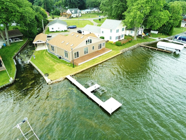 birds eye view of property featuring a water view and a residential view