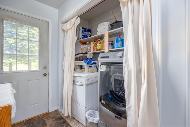 laundry area with independent washer and dryer