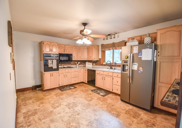 kitchen featuring light brown cabinetry, tasteful backsplash, sink, ceiling fan, and black appliances