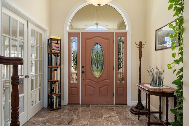 foyer entrance featuring french doors