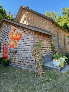 view of home's exterior featuring a lawn