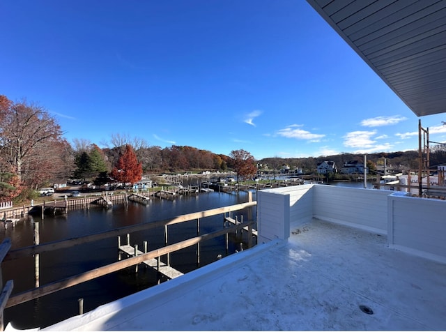 exterior space with a water view