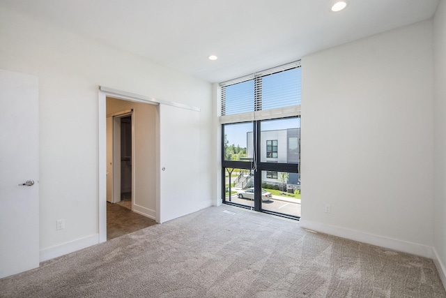 view of carpeted empty room