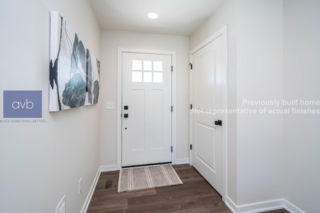 doorway featuring dark hardwood / wood-style floors