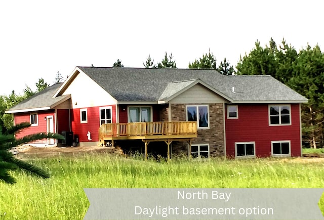 back of property featuring a wooden deck and central AC unit