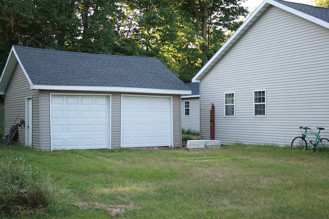 garage with a yard