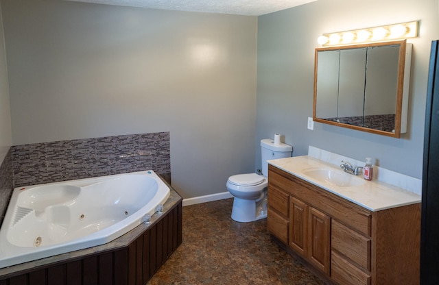 bathroom featuring vanity, toilet, and a bathing tub