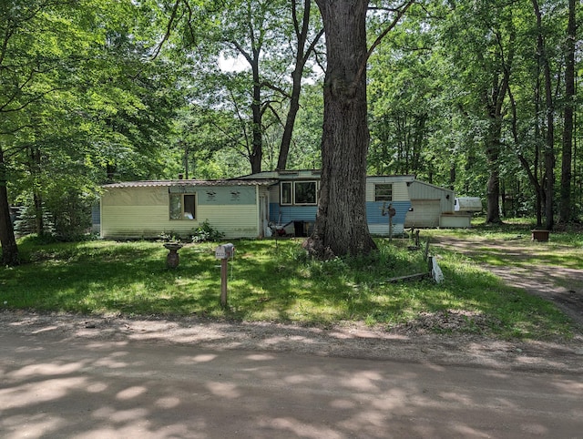 view of front of home featuring central air condition unit