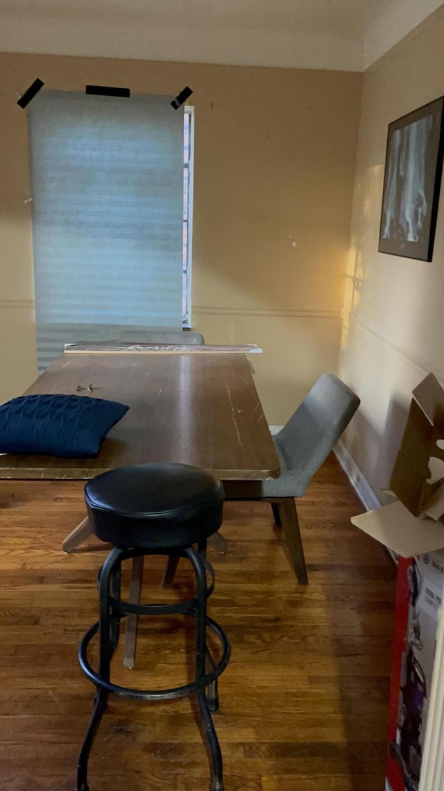 dining room with dark hardwood / wood-style floors