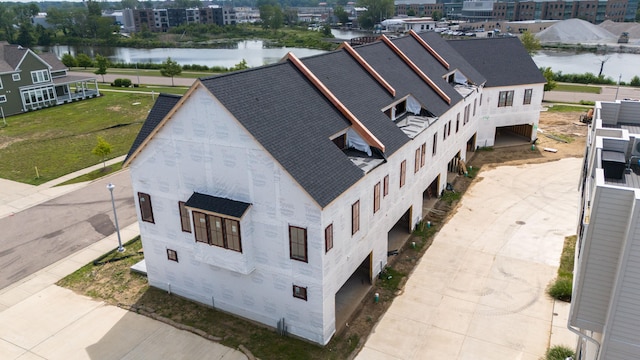 bird's eye view with a water view