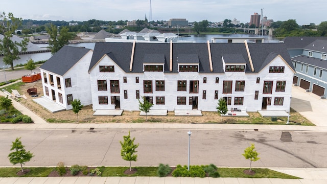 drone / aerial view with a water view