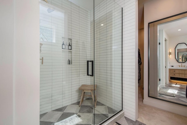 bathroom with vanity and an enclosed shower