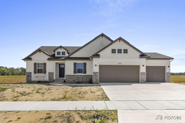 craftsman inspired home with a garage