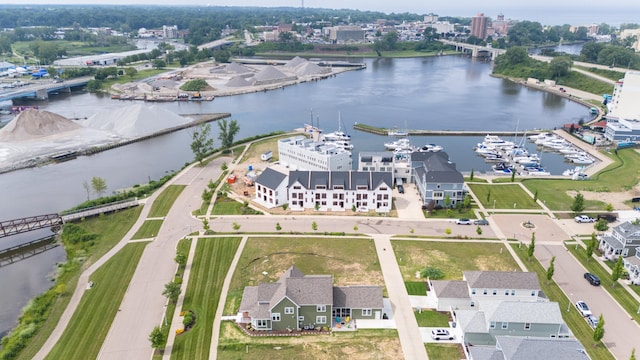 birds eye view of property featuring a water view