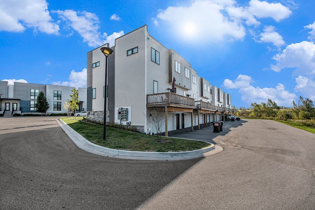 view of building exterior featuring a garage