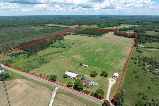 birds eye view of property featuring a rural view