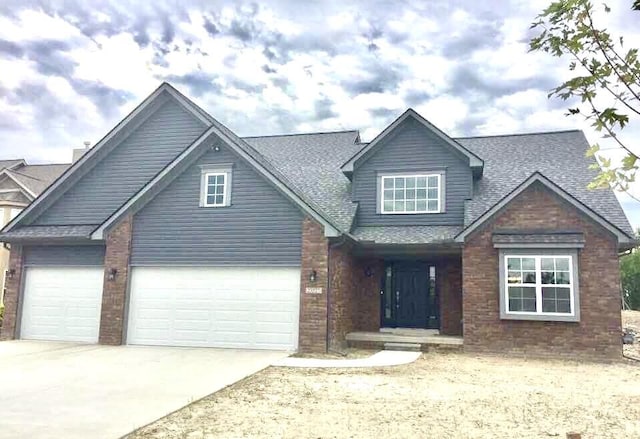 view of front of property with a garage