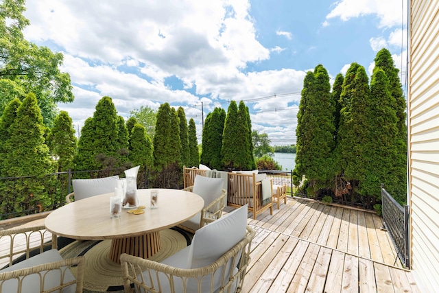 deck featuring a water view