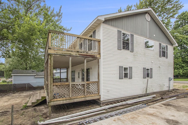 rear view of house with a deck