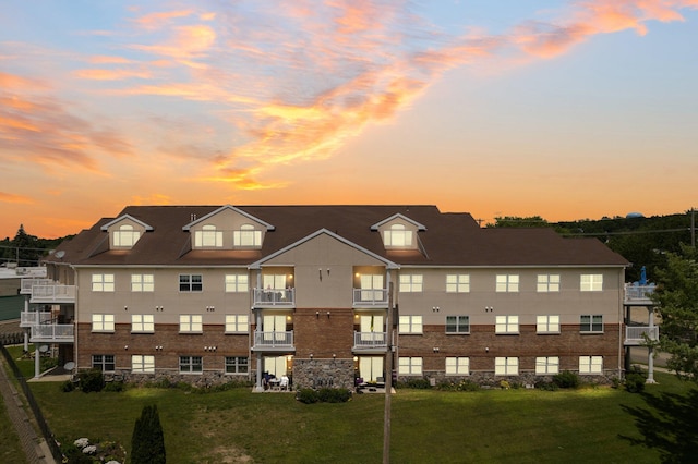 view of outdoor building at dusk