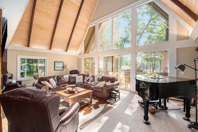 carpeted living room with high vaulted ceiling, wood ceiling, and beam ceiling