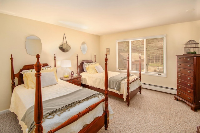 carpeted bedroom featuring a baseboard radiator