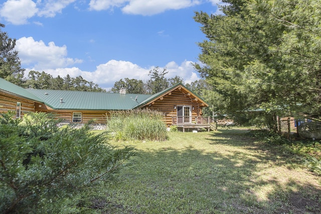 view of yard featuring a wooden deck