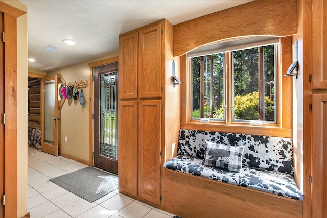 interior space featuring light tile patterned flooring