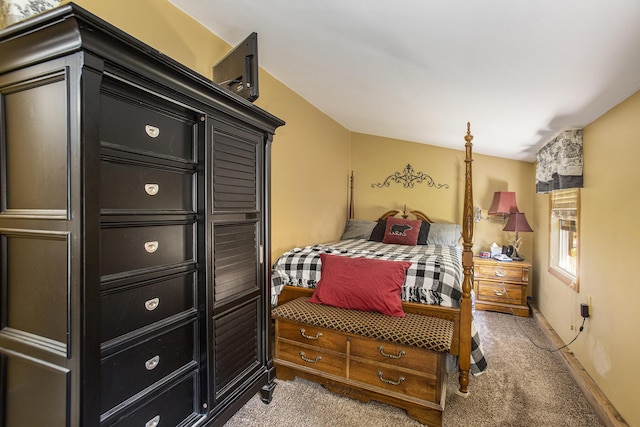 bedroom with light colored carpet