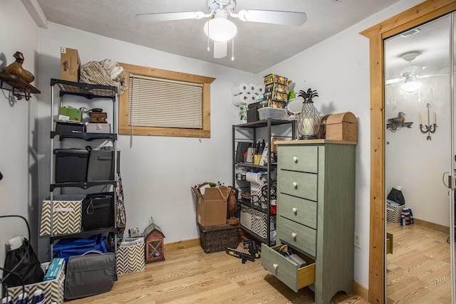 storage room featuring ceiling fan