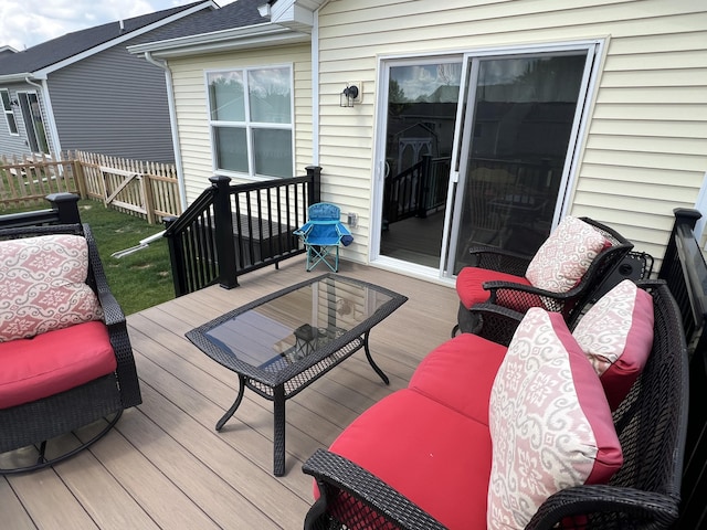 wooden deck featuring an outdoor living space