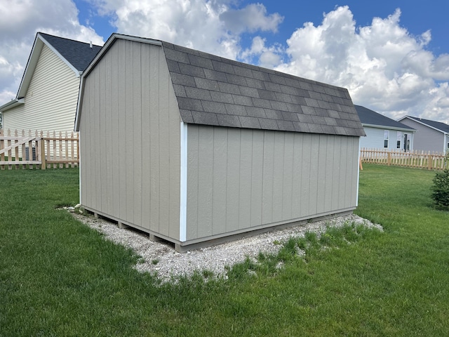 view of outdoor structure with a yard