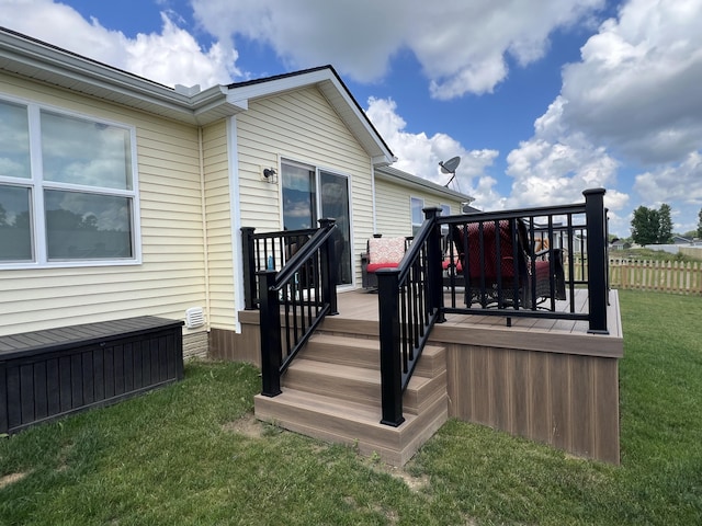 deck featuring a lawn