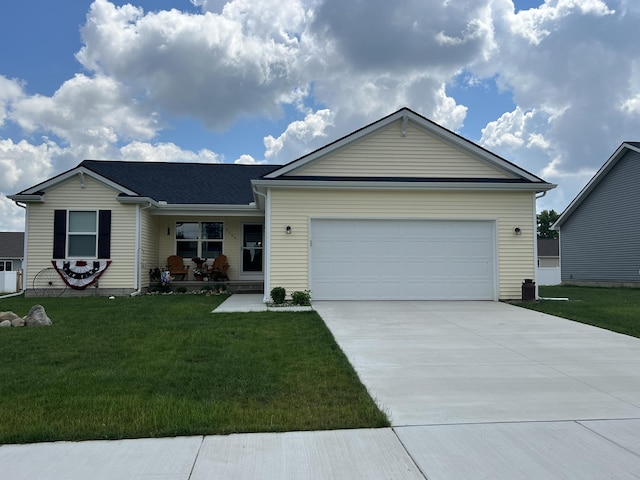 ranch-style home with a front yard and a garage