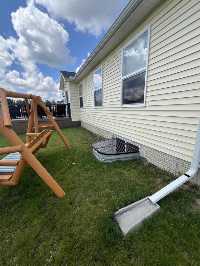 view of yard with a wooden deck