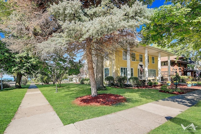 view of front of home with a front yard