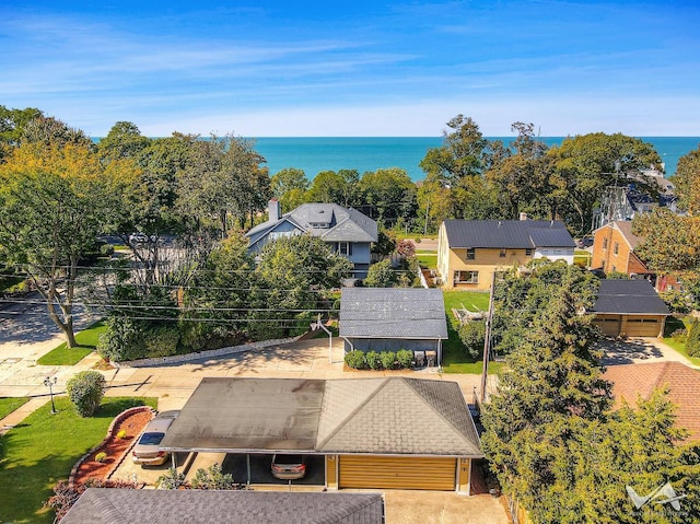 drone / aerial view featuring a water view