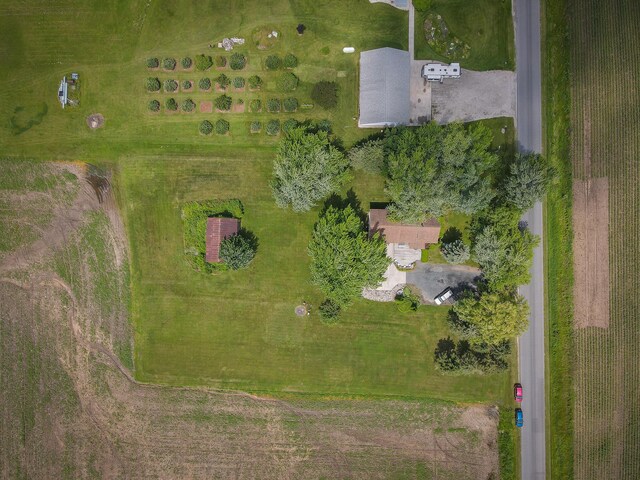 birds eye view of property featuring a rural view