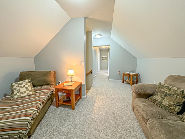 living room with light colored carpet and vaulted ceiling