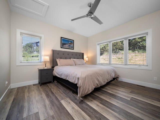 bedroom featuring dark wood-type flooring and ceiling fan