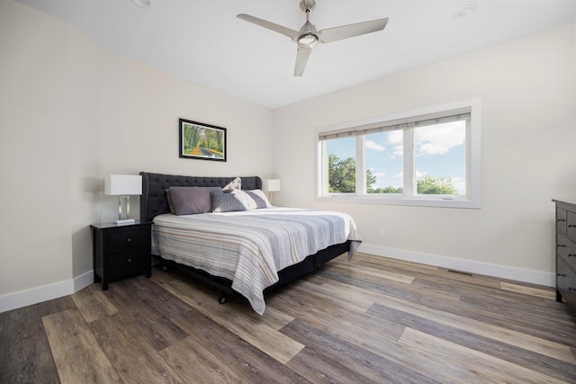 bedroom featuring hardwood / wood-style flooring and ceiling fan