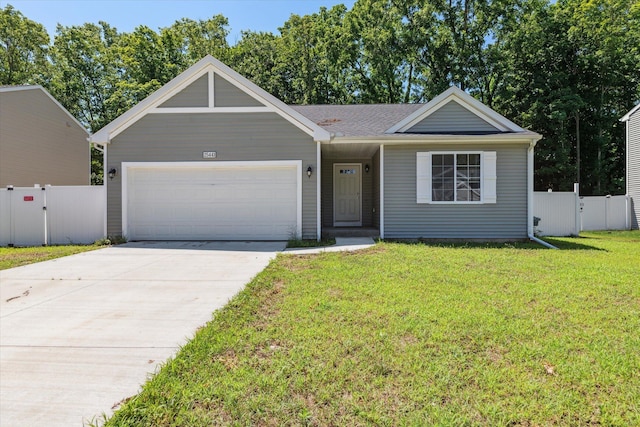 ranch-style home with a garage and a front lawn