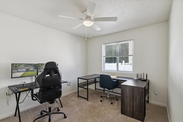 carpeted office with ceiling fan